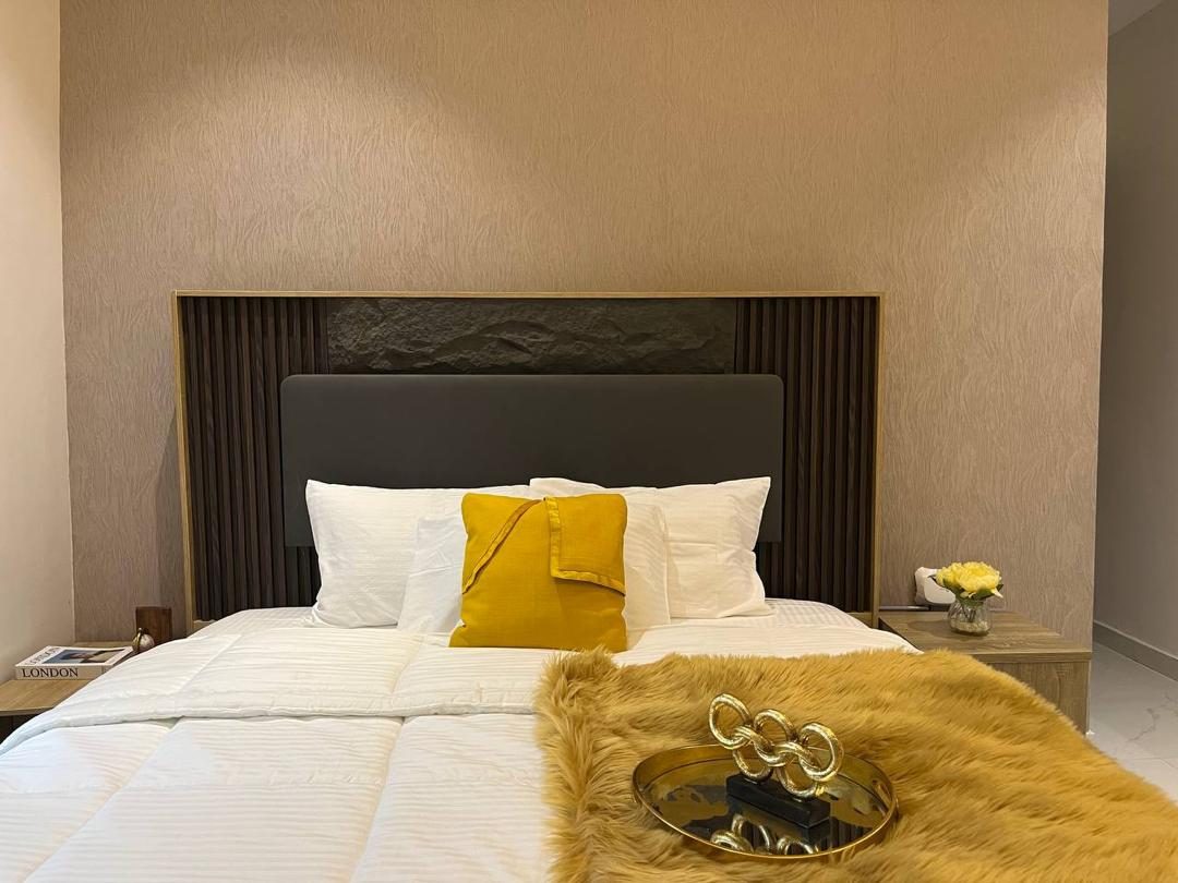 Bedroom with fluted headboard, Apartment Bravo, Nimbus Nook Ikeja GRA