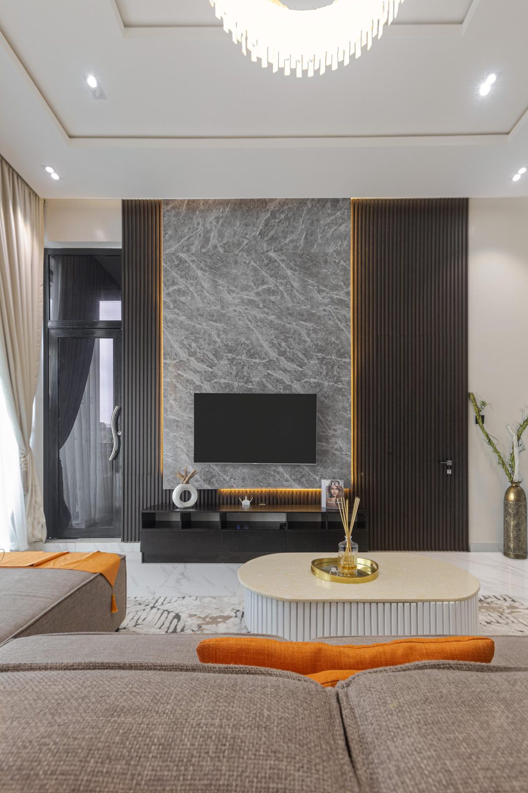 Marble TV wall with ambient lighting, Apartment Bravo, Nimbus Nook Ikeja GRA
