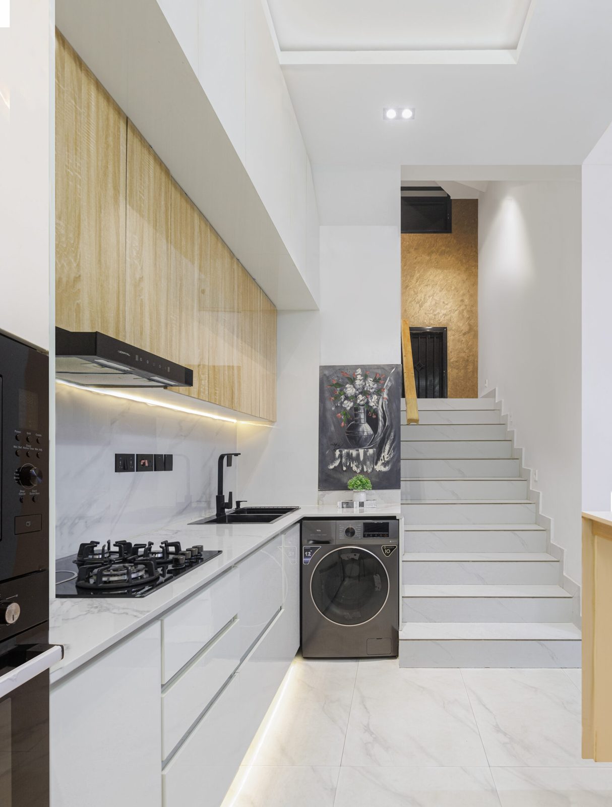 Kitchen and staircase at Nimbus Nook shortlet apartments, Ikeja GRA